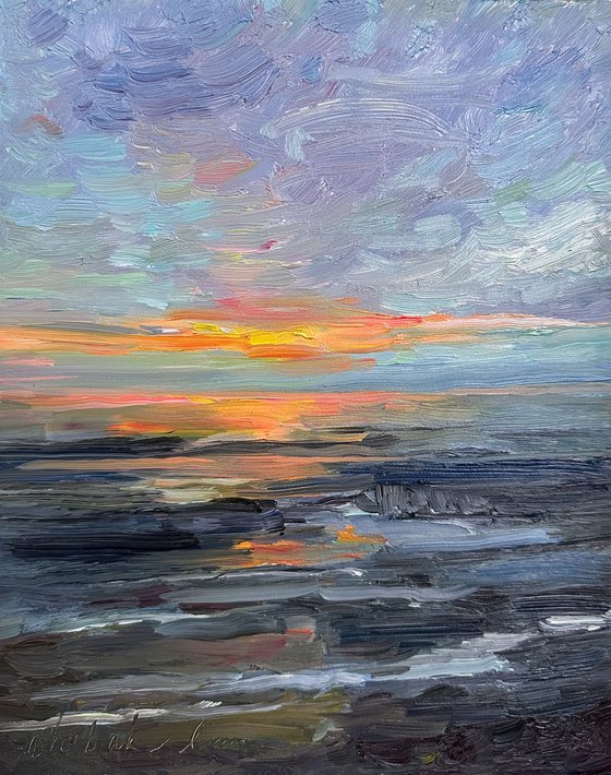 The sunset over the Atlantic Ocean