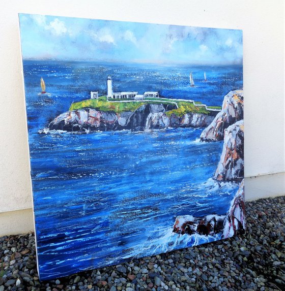 Lighthouse On The Rocks.  Lighthouse. Anglesey coast. Cliffs