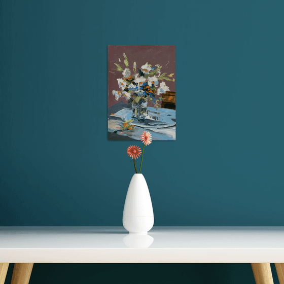 White flowers in a glass vase.