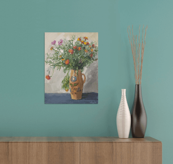 Marigolds in a ceramic pot