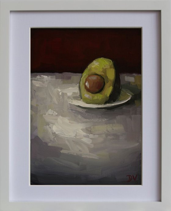 Avocado with plate.