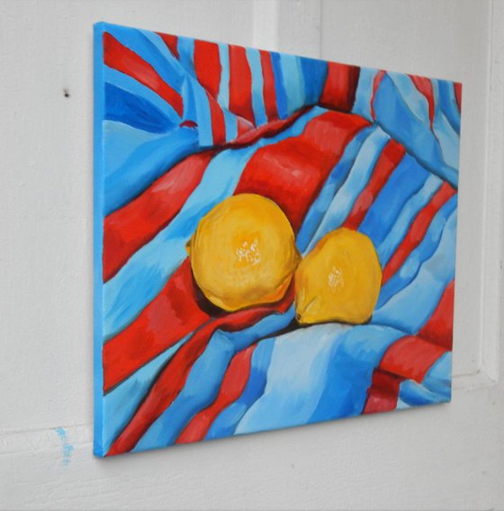 Lemons on the tablecloth. Still life. 30x40cm