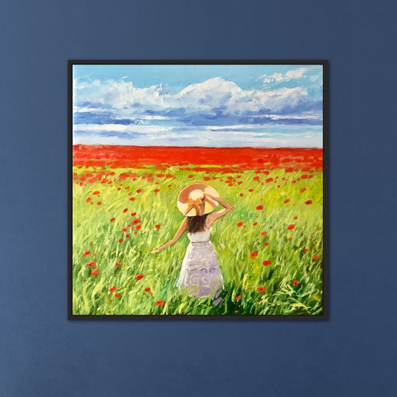 Women in poppy field