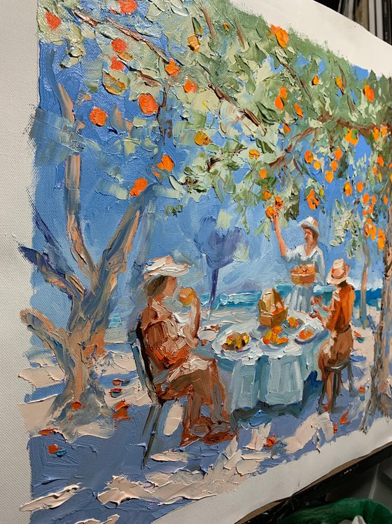 Picnic by tangerine tree