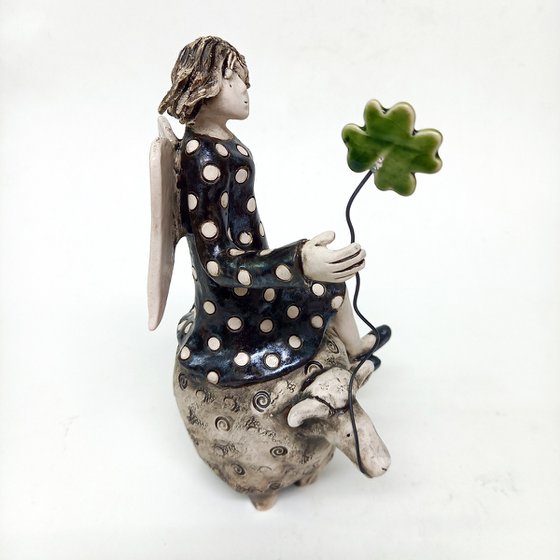 Whimsical Angel on Sheep