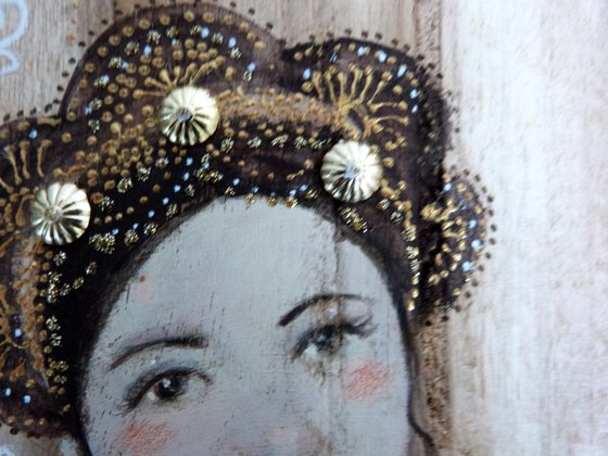 Portrait on wood, woman with a sacred heart. Sacred flight.