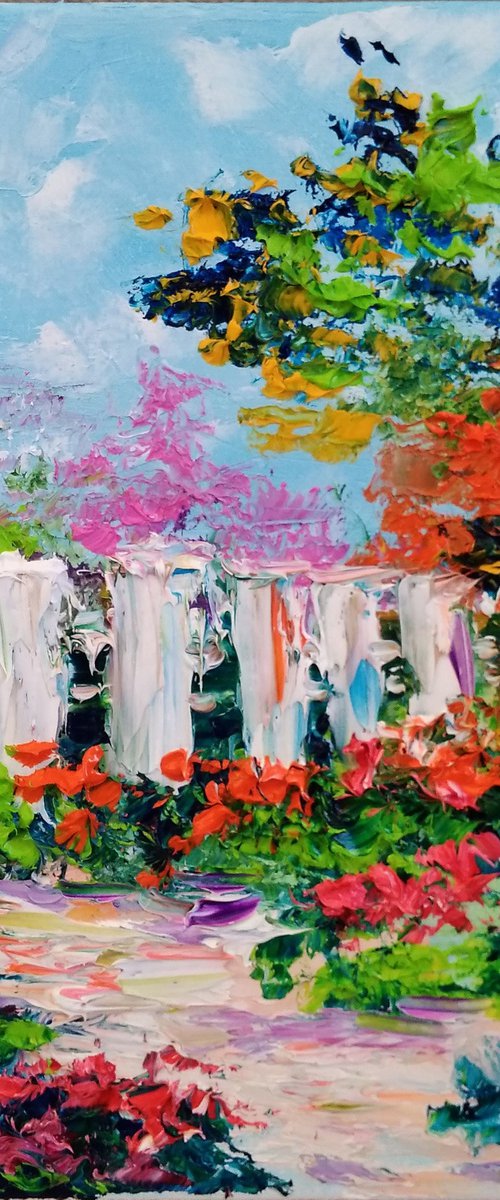 Fence and flowers in village by Oksana Fedorova