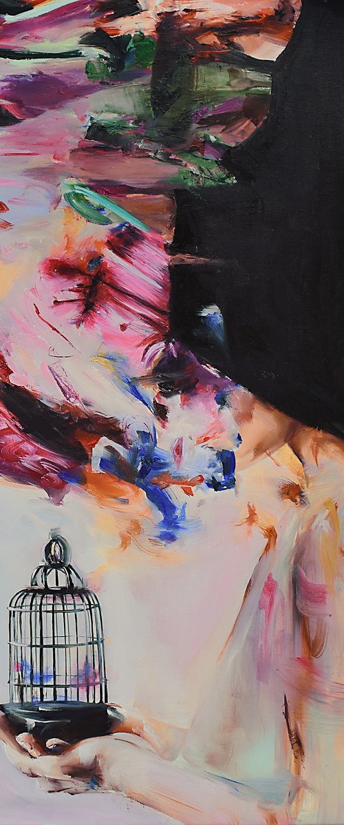 She held the cage gently by Vanessa Poutou