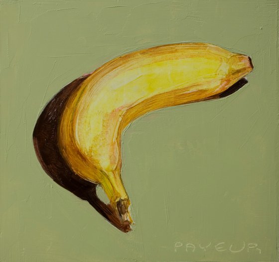 modern still life of banana on green background