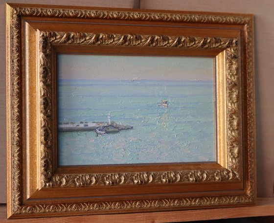 Sunset. The sea is calm. Bali. Crete. Greece