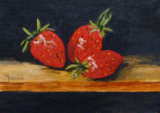 Three Strawberries