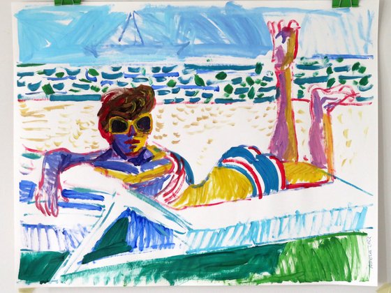 The beach with woman sunbathing