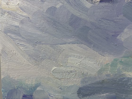 Clouds over the field and ditch