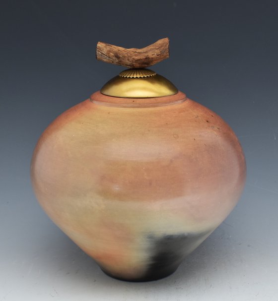 Sagger fired porcelain covered vessel with brass and cork fittings. B04 130 cubic inches