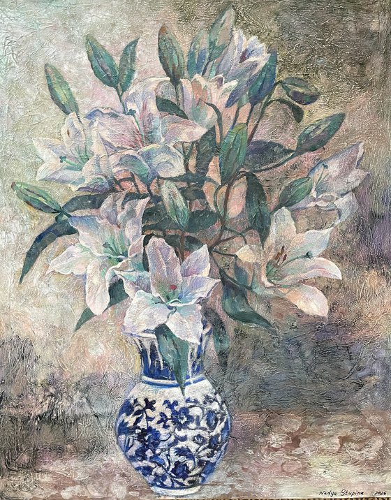 Lilies in a blue and white vase