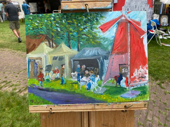 Red windmill at art festival
