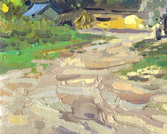 Blue tractor at the sawmill. Rodnya village