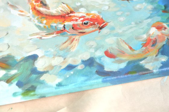 Bright red fish on blue