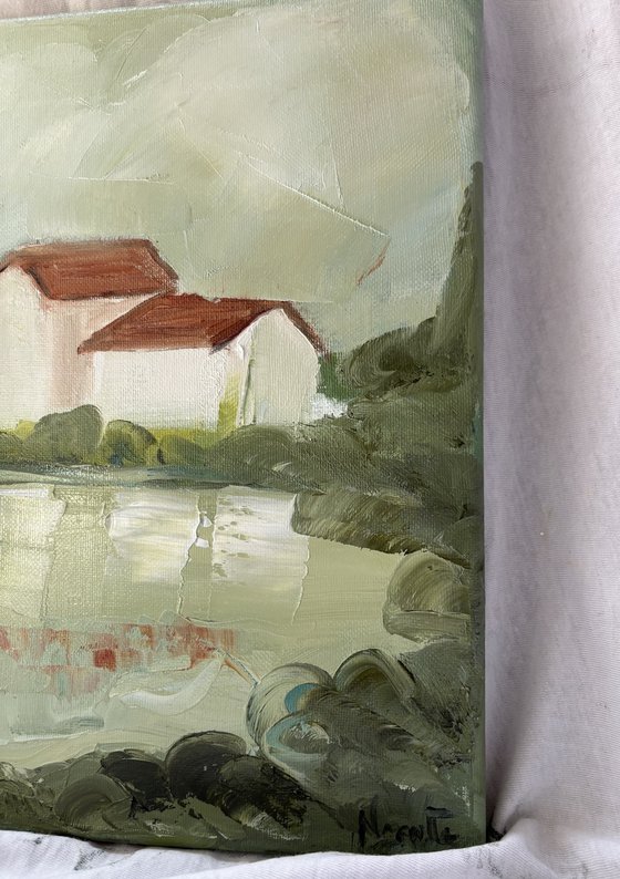 Toscana hills white houses with lake.