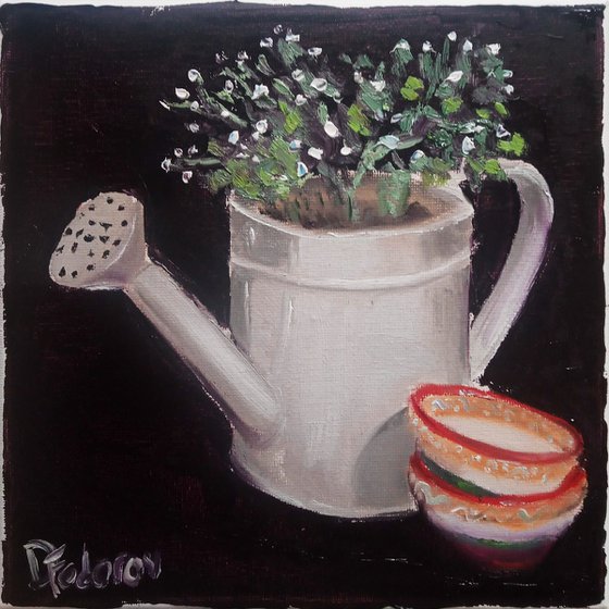 Still life with a watering can and small bowls