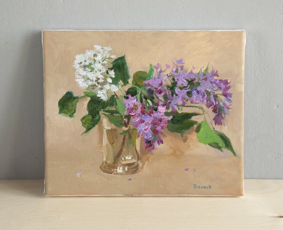 Lilacs in a Transparent glass