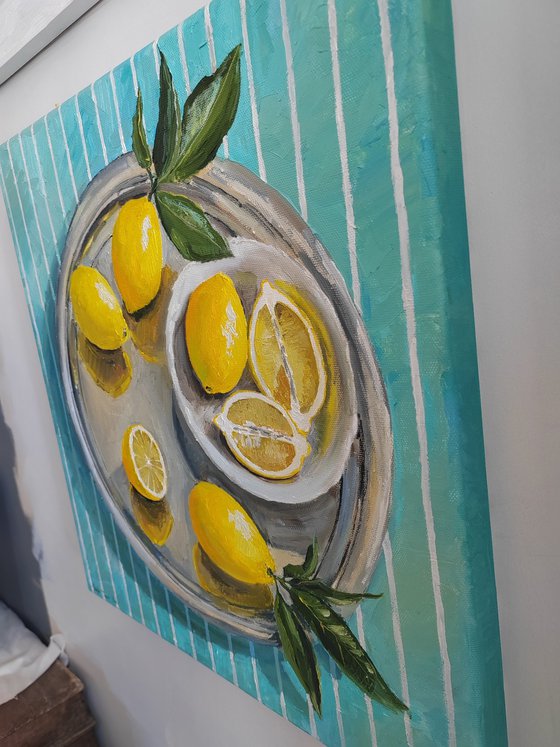 Lemons on turquoise stripen tablecloth