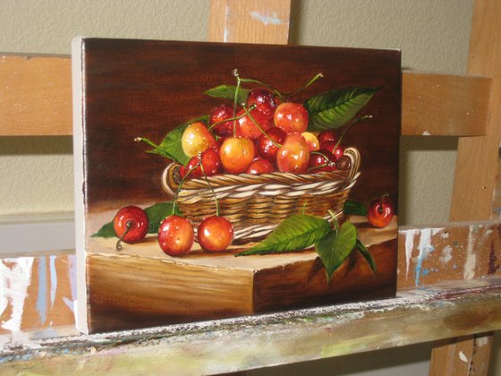 The cherry in a basket.