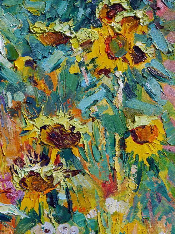 By a sunflowers field