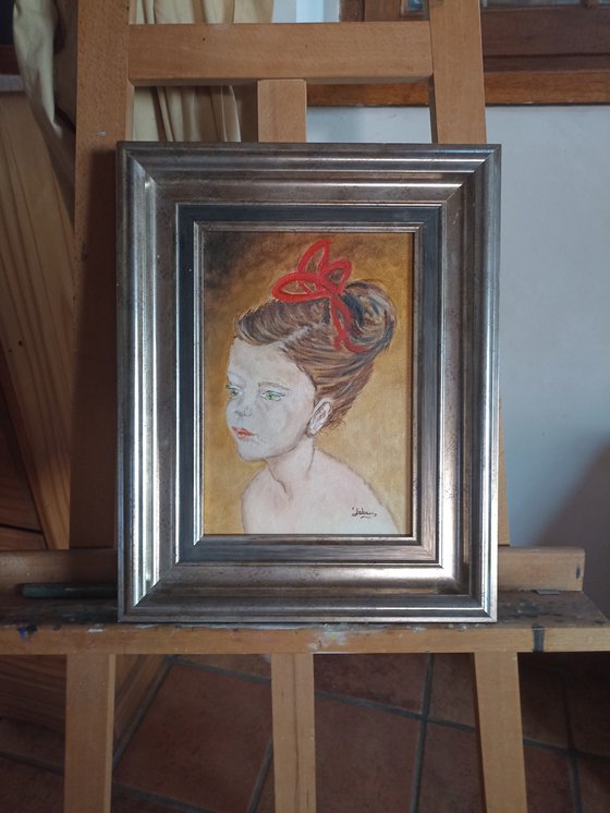 girl with red ribbon