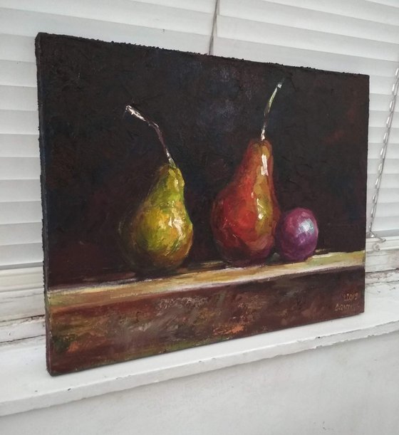 Still life with pears and plum