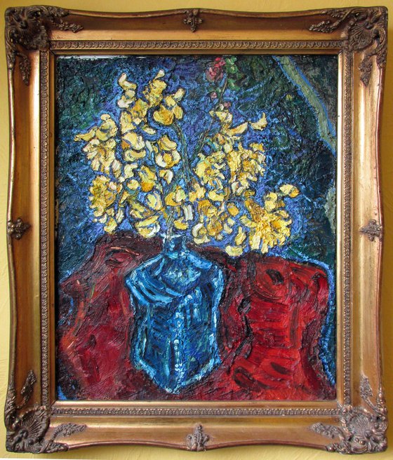 Daffodils in blue square glass