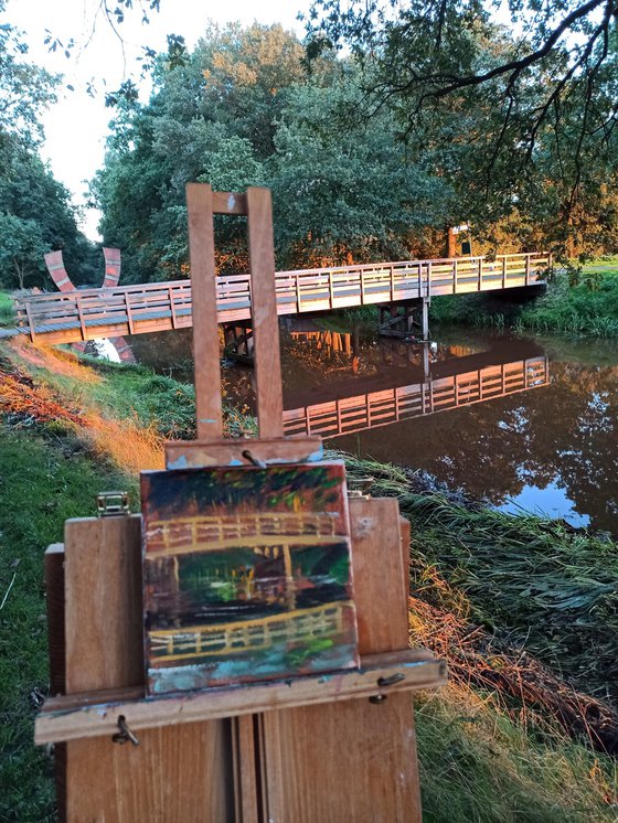 Small wooden bridge. Pleinair