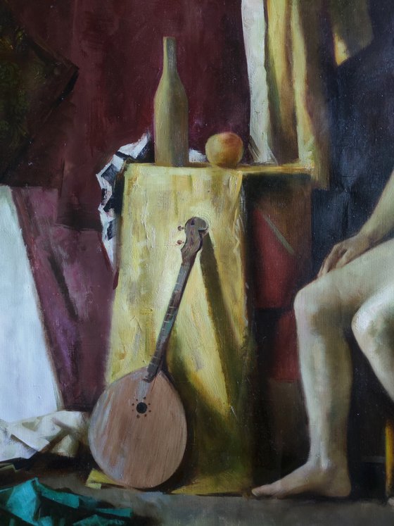 Nude staging with a guitar