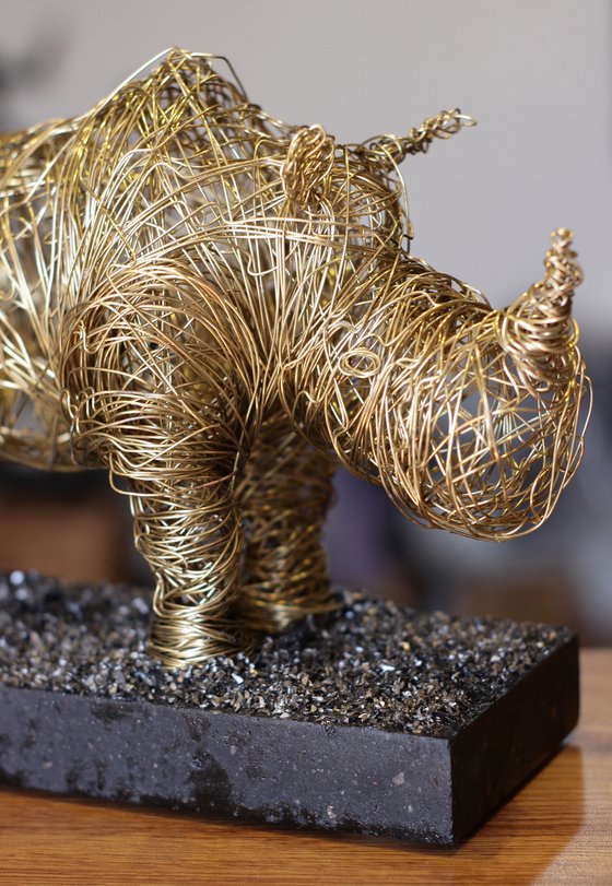 Golden rhino (20x30x12 2.9kg iron, brass, tufa)