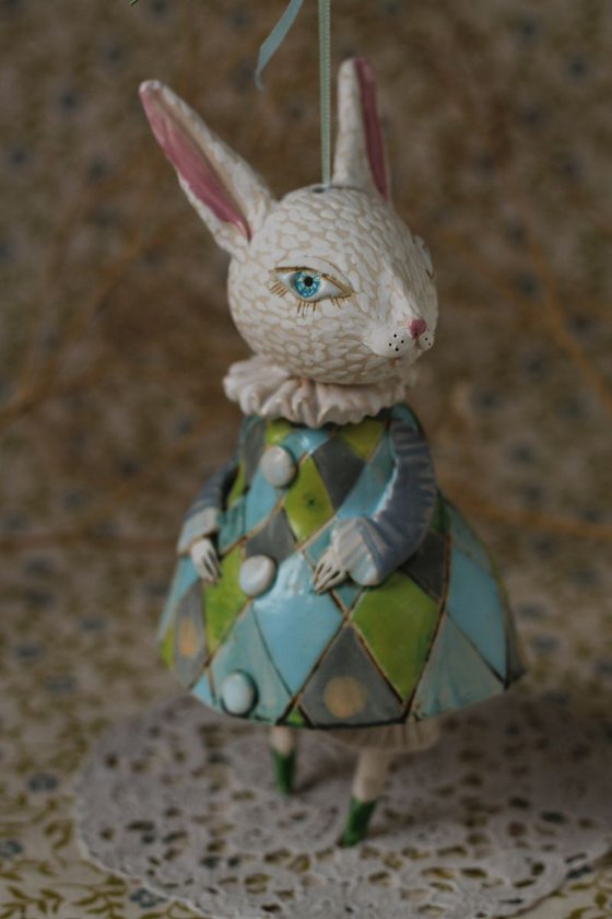 Little rabbit in harlequin dress. Hanging sculpture, bell doll by Elya Yalonetski