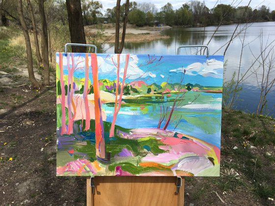 Pink trees by the lake