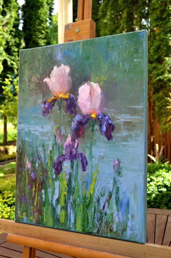 Three Irises by the pond