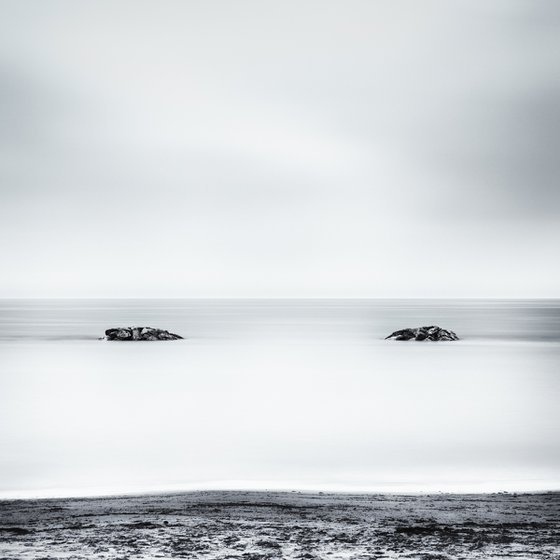 Two rocks emerging from the sea