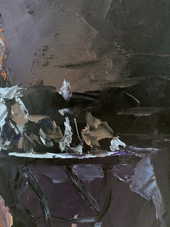 Woman in a cafe on black.