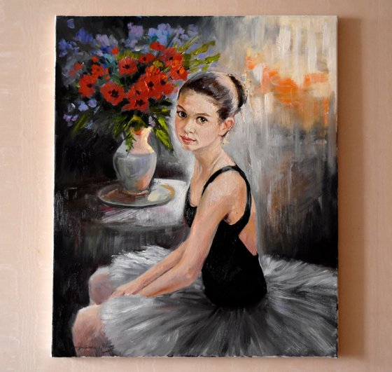 A small ballerina with red poppies