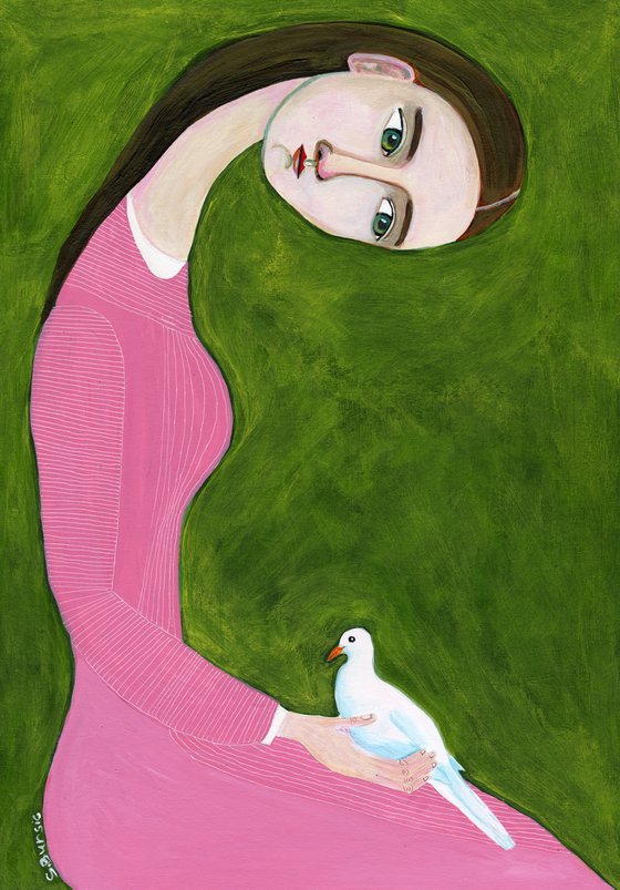 Girl in pink dress with white dove