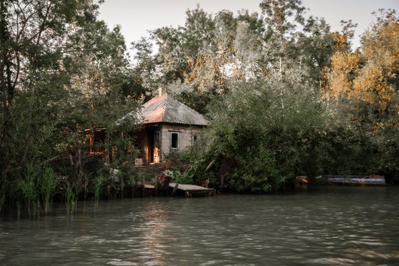 Abandoned house by the river