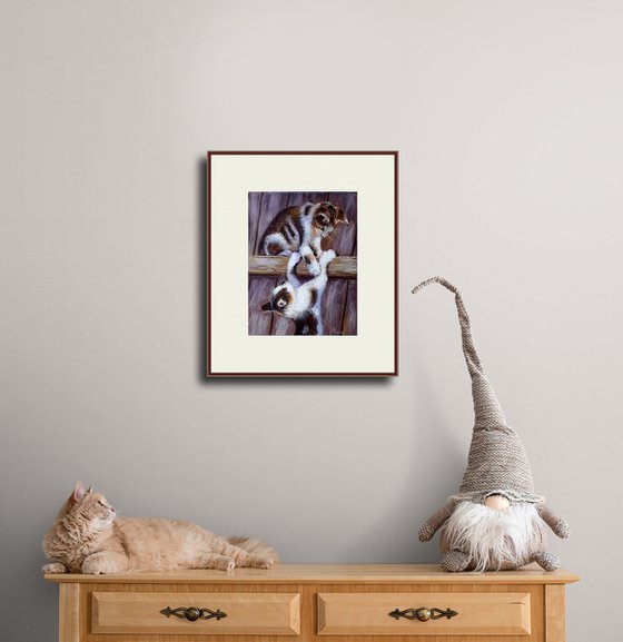 Playful Kittens on the Fence