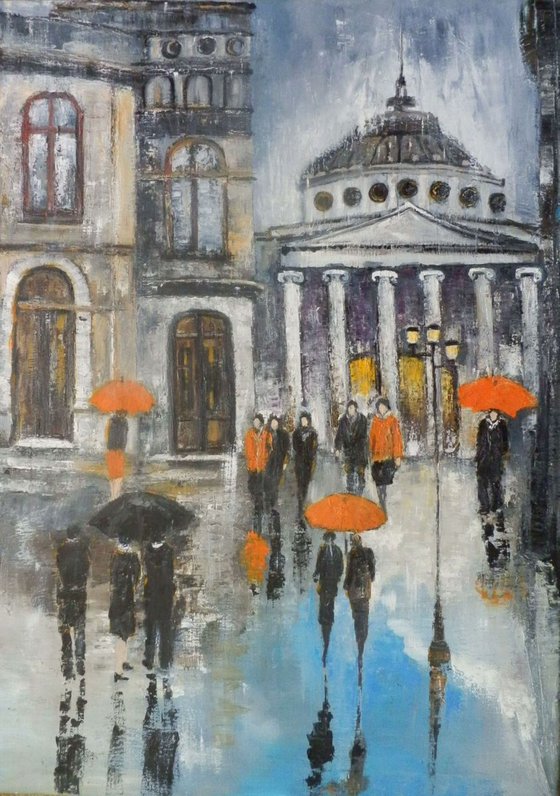 People on a street on a rainy day