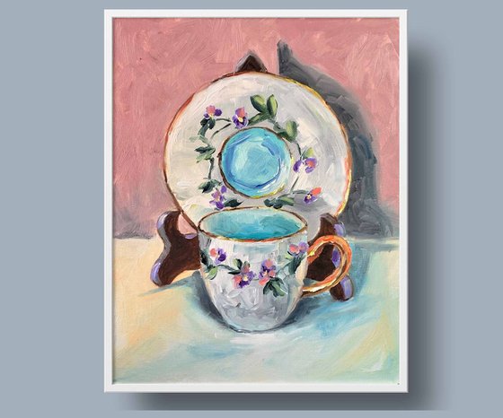 Teacup and saucer.