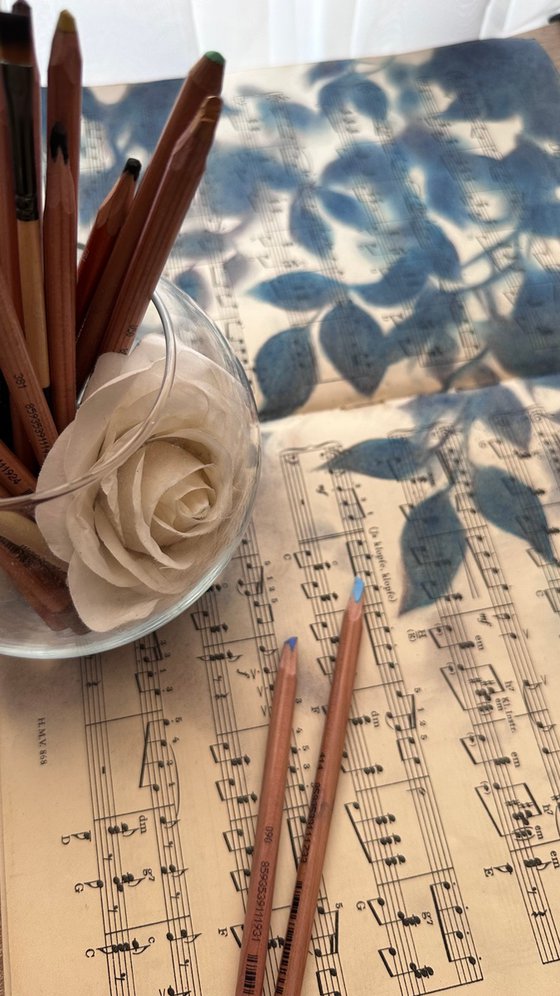 Leaf Silhouette Pastel on Vintage Sheet Music