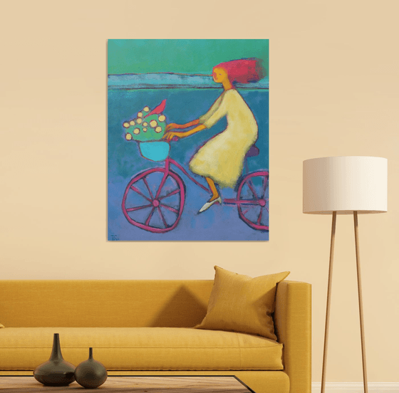 Ride on a pink bike.