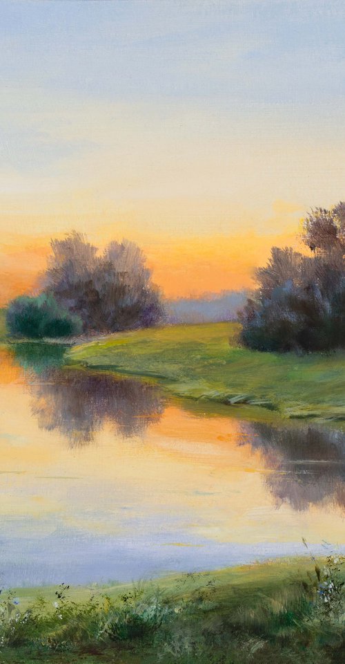 Soft sunrise sky over the river by Lucia Verdejo