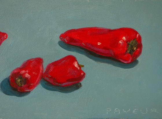 modern still life of red peppers