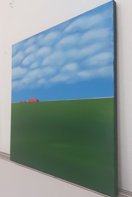 Red roofs, green fields